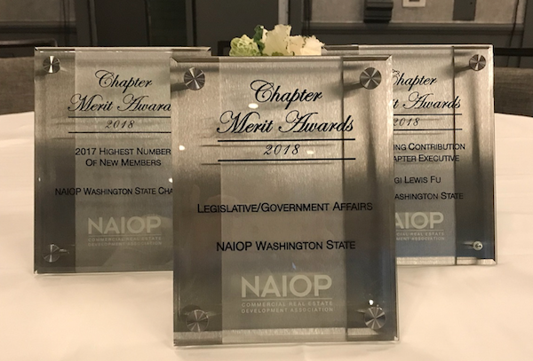 photo of three awards on a table