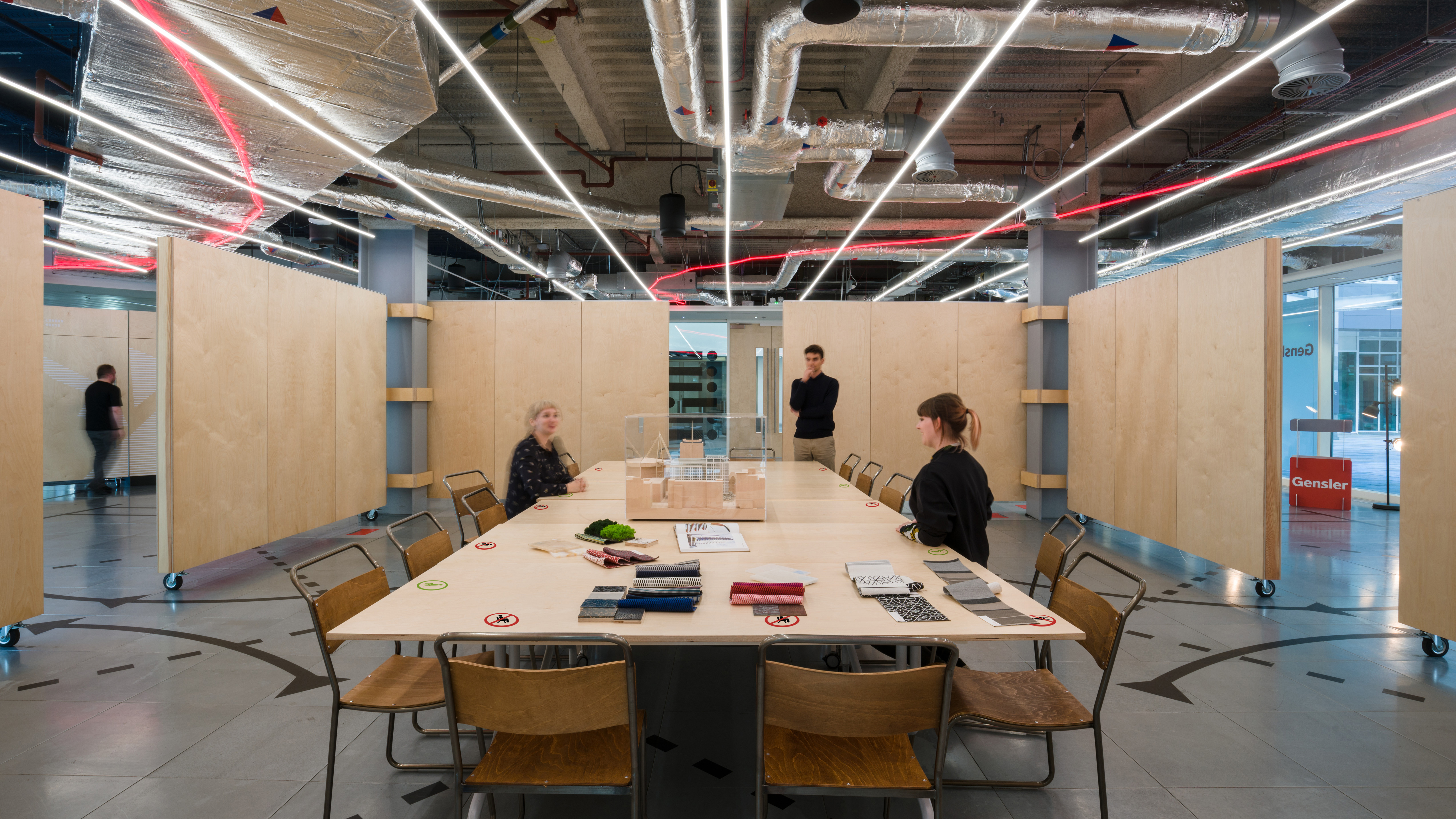 Conference area at Gensler demonstrating physical distancing with clear signage